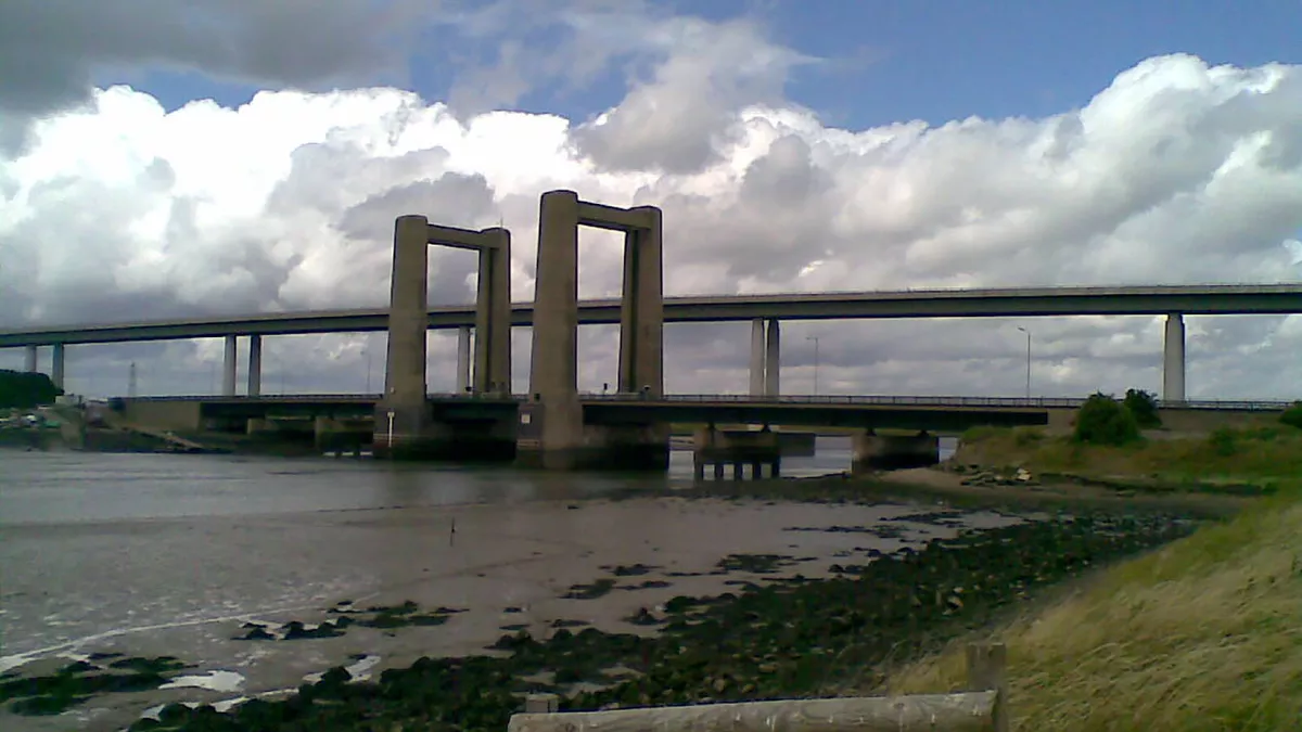 The Kingsferry Bridge, looking West from the Isle of Sheppey, with the more modern Sheppey Crossing behind.
