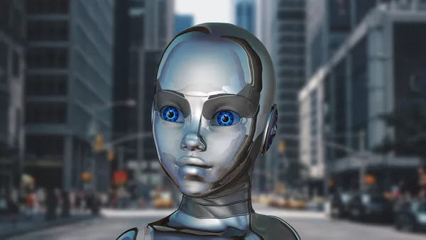 A shiny silver robot face with blue eyes.