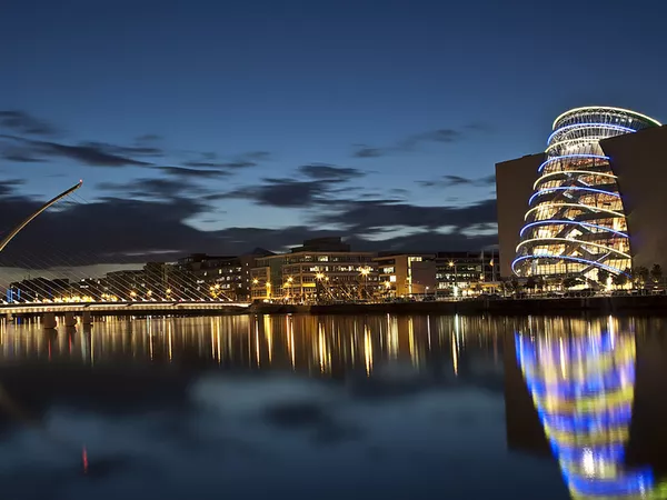 The Convention Centre Dublin (CCD) - a large glass cylindrical building situated on Dublin's River Liffey.