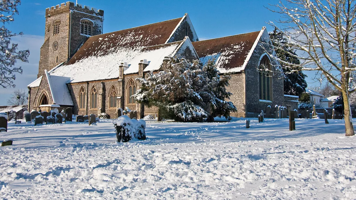 Church of England parish church of St Mary in Thatcham during a heavy snowfall.