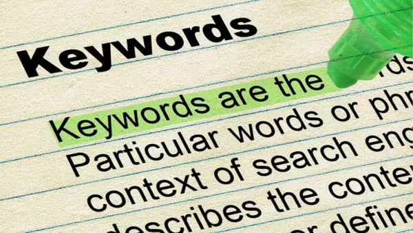 A piece of paper with the title Keywords and then some text underneath, an area of which is highlighted which reads: &apos;Keywords are the&apos;.