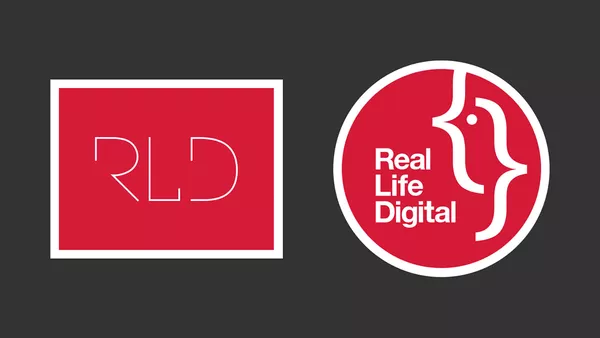 The old &apos;RLD&apos; Real Life Design logo next to the new circular Real Life Digital logo on a dark grey background.