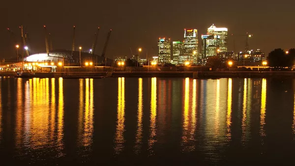 The Millennium Dome and Canary Wharf from the Royal Victoria Dock.