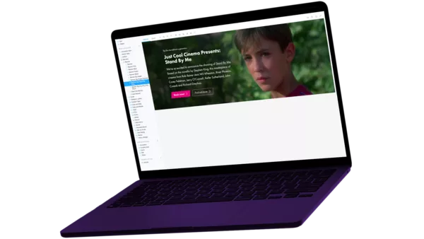 Phoenix Art's Storybook shown on a MacBook Pro lit by purple lights.