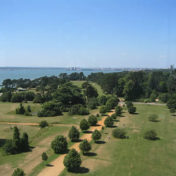 View from Netley Hospital chapel tower, in the Royal Victoria Country Park, Netley, Hampshire, UK. Looking north-west across the park, up Southampton Water, towards Southampton.